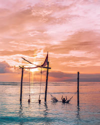 Scenic view of sea against sky during sunset