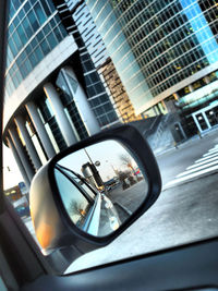 Reflection of modern buildings in city