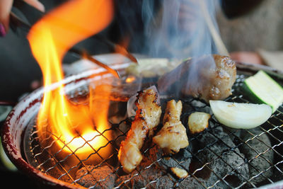 Close-up of meat on barbecue grill