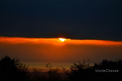 Scenic view of sunset over sea