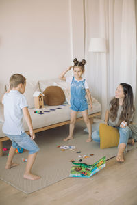 Children playing with toy at home