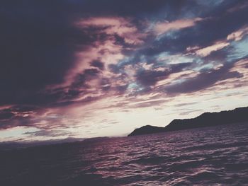 Scenic view of sea against dramatic sky