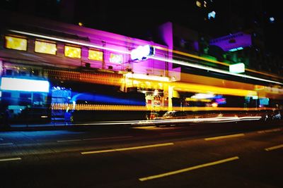 Light trails on city street at night