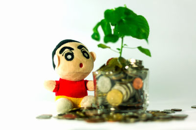 Close-up of stuffed toy over white background