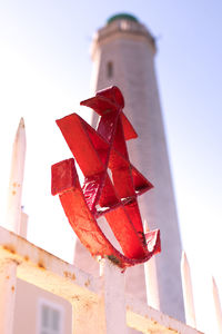 Low angle view of red built structure against sky