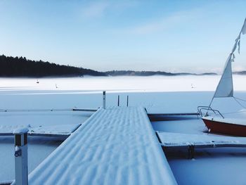 Scenic view of sea against sky during winter