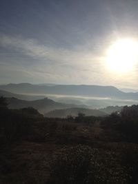 Scenic view of landscape against sky during sunset