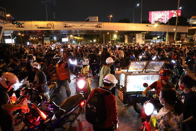 People on street at night