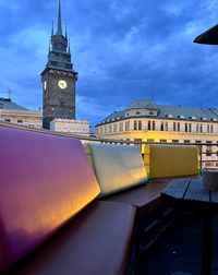 Buildings in city from a coloured illuminated terrace 