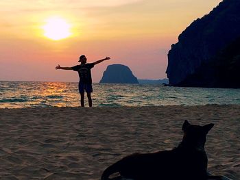 Full length of man standing on beach