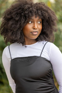 Portrait of young woman looking away