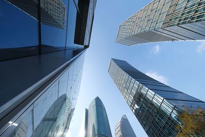 Low angle view of modern buildings against sky