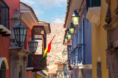 Bolivian flag amidst buildings