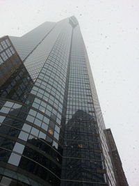 Low angle view of skyscrapers against sky