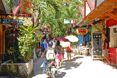 People walking on street in city