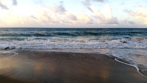 Scenic view of sea at sunset