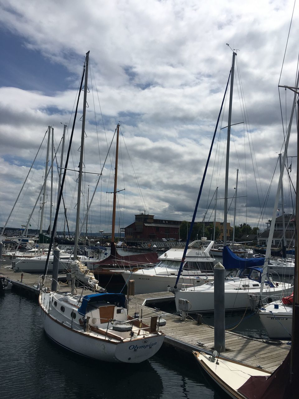 nautical vessel, cloud - sky, transportation, water, mode of transportation, sailboat, sky, moored, mast, pole, harbor, sea, nature, day, no people, architecture, outdoors, built structure, travel, yacht, marina, port