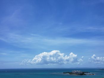 Scenic view of sea against blue sky