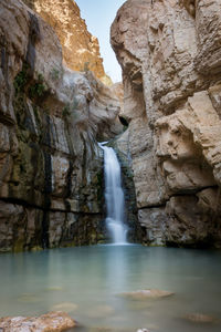 View of waterfall against sky