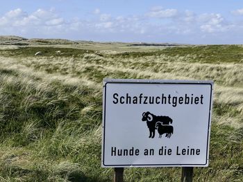 Warning sign on field for sheeps 