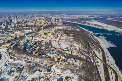 Beautiful winter top view of the kiev-pechersk lavra. beautiful panorama of kiev in the afternoon.