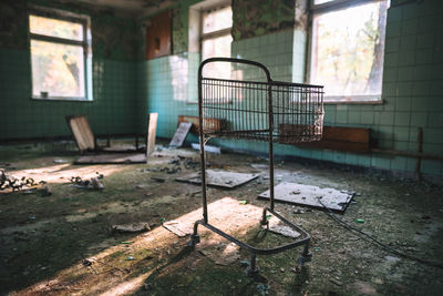 Empty chairs in abandoned room