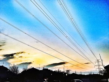 Low angle view of silhouette birds against sky