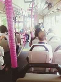 Rear view of people in bus