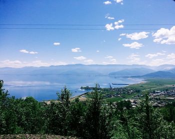 Scenic view of town against sky