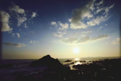 Scenic view of sea at sunset