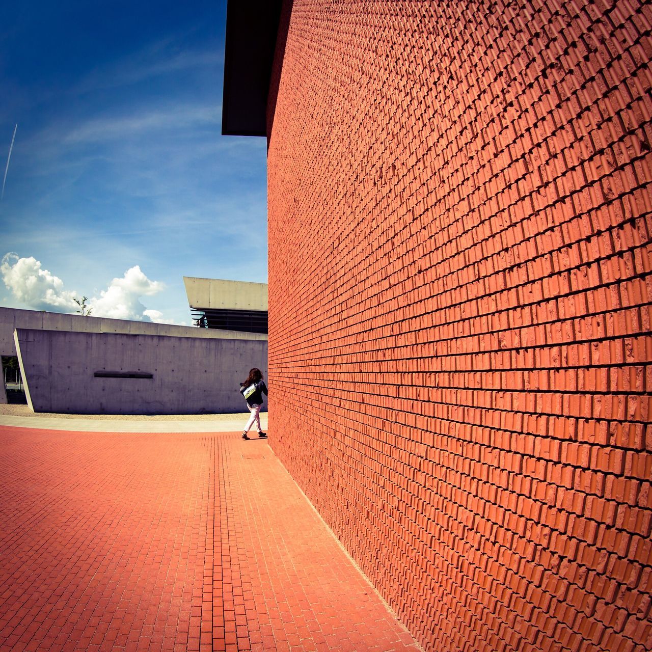 architecture, built structure, building exterior, walking, sky, wall - building feature, day, modern, outdoors, cloud - sky, red