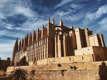 Low angle view of historical building against sky