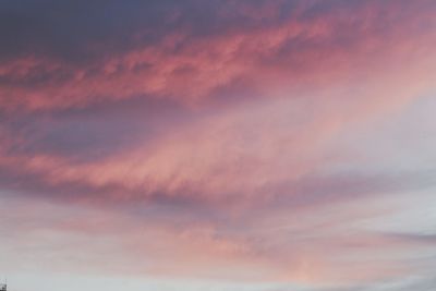 Low angle view of dramatic sky during sunset