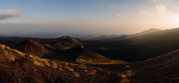 Scenic view of mountains against sky during sunset