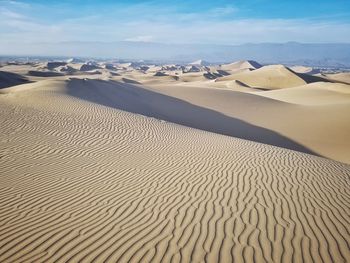 Scenic view of desert against sky