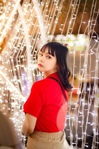 Young woman standing in gym