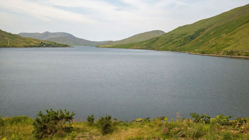 Scenic view of lake and mountains against sky in connemara national park