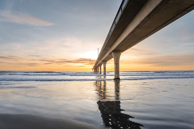 Beautiful sunrise at new brighton pier, christchurch, new zealand.