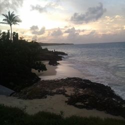 Scenic view of sea at sunset