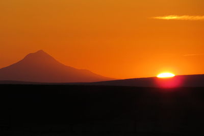 Scenic view of mountains at sunset