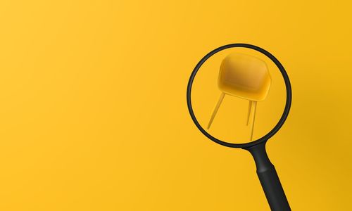 Close-up of stethoscope against yellow background