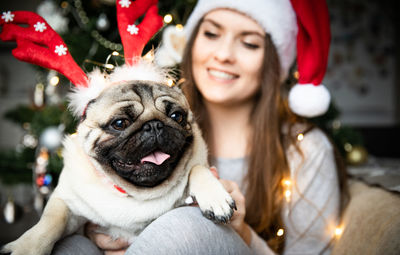 Portrait of woman with pug