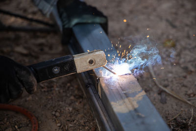 Man working on metal structure