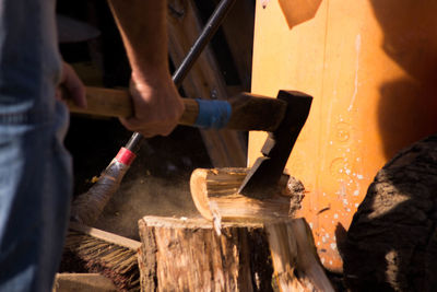 Close-up of man working on wood