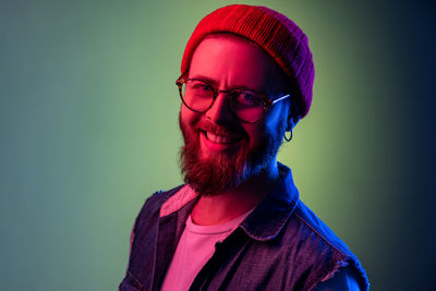 Portrait of young man wearing knit hat