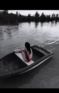 Man in boat on lake