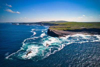 Aerial view of a rocky shore of kilkee cliffs. 