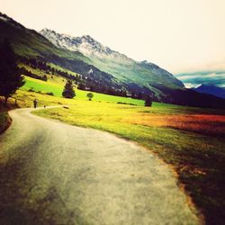 Landscape with mountain range in background