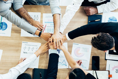 High angle view of people on table