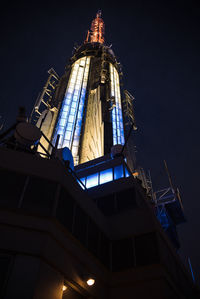 Low angle view of illuminated built structure